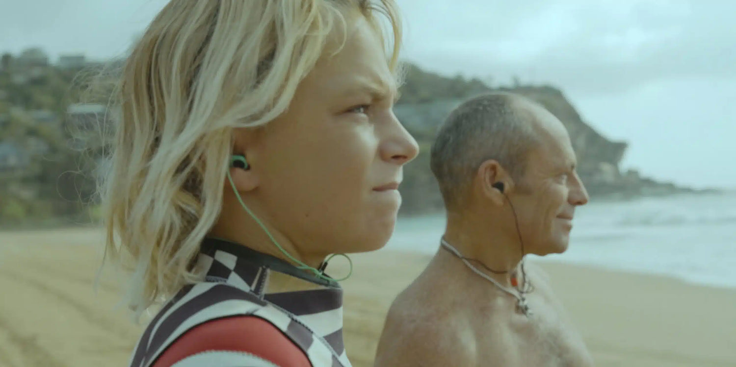 Surfers wearing SurfEars